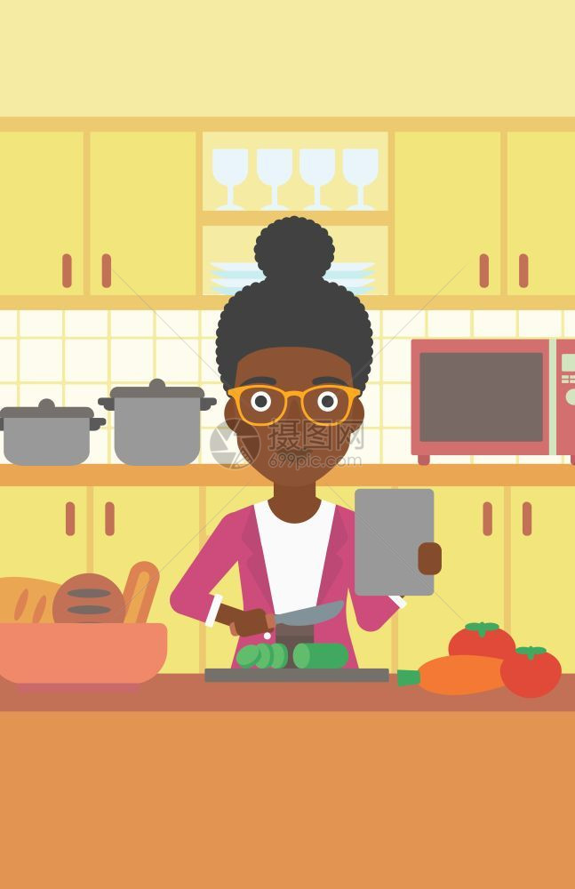 按照网上教程在厨房做蔬菜沙拉的女人图片