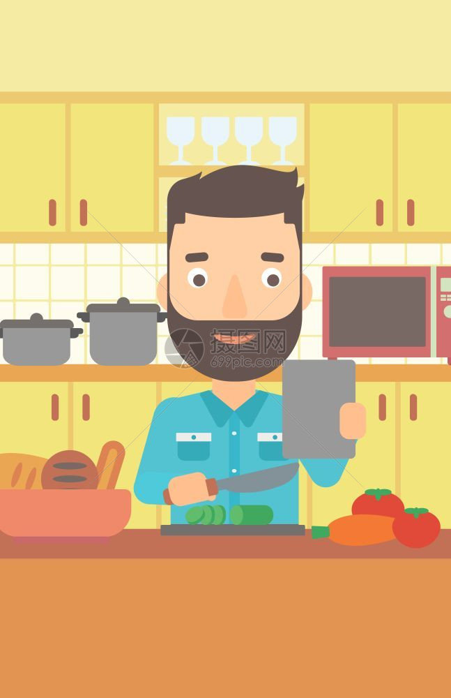 按照网上教程在厨房做蔬菜沙拉的男人图片