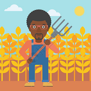 大裤叉一位手持草叉的男农民站在小麦田背景上插画