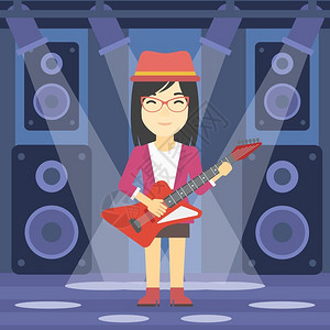 舞台上演奏电吉他的女人图片