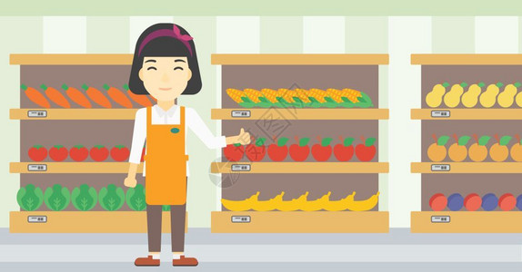一位在蔬菜和水果货架旁竖起大拇指的女员工图片
