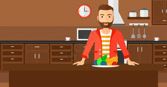 一个长着胡子的潮男站在厨房图片