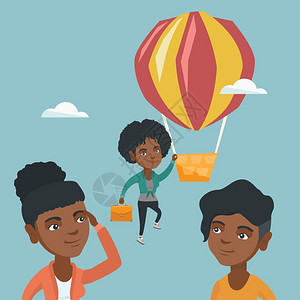 两位非洲人看着一位非洲女人在气球上图片