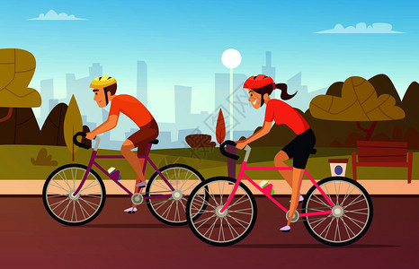 男女骑自行车者在城市公园骑自行车者图片
