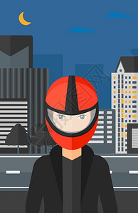 戴头盔的人及夜间城市背景背景图片