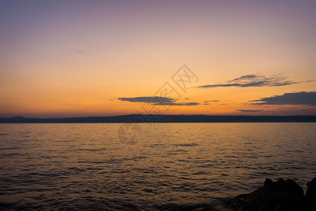 海洋滩日落或日出的美丽景色图片