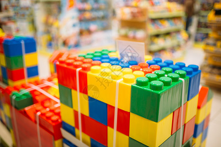 彩色方形漂浮块玩具店的彩色立方体学龄前儿童的教育游戏大塑料砖块背景