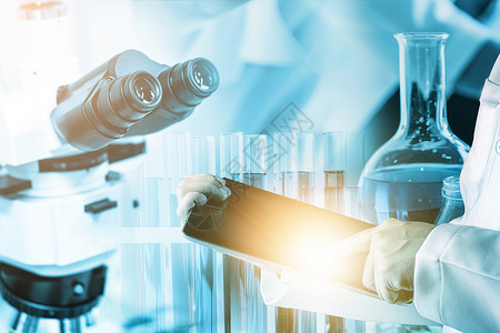 DNA管研发概念科学和医实验室仪器显微镜用于生物学的试验管和玻璃瓶以及用于医学研究的实验室化学双重接触图像背景