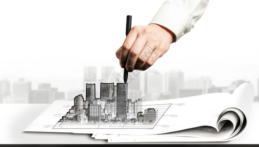 城市民政规划和房地产开发设计师在设计城市草图背景图片