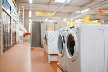 电子商店的器家用在超市的销售电子商店的新洗衣机没有人背景