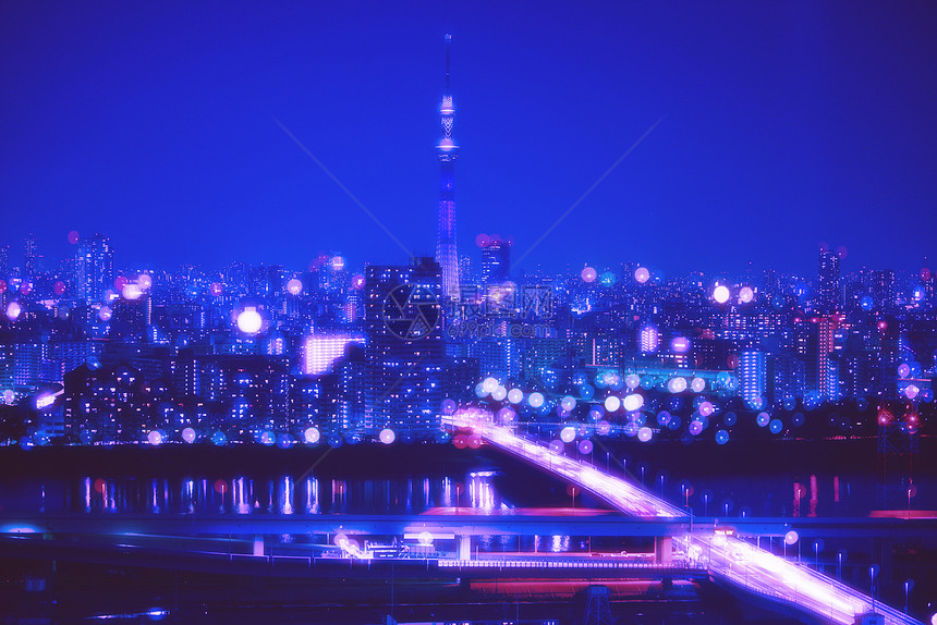 东京的夜生活背景东京的天空线有模糊的bokeh灯装饰在多彩的过滤器中东京的天空树城市景色背东京城市的夜天空和生活概念图片