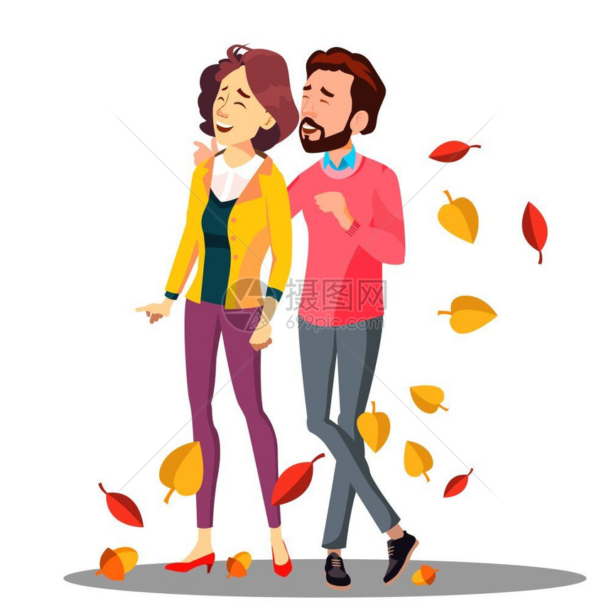 年轻夫妇在秋天落叶中行走图片