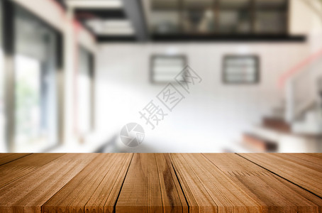 木板和模糊的咖啡店背景图片