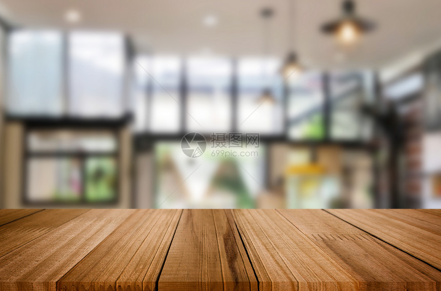 木板空桌顶内部模糊咖啡店背景模糊拟显示产品图片