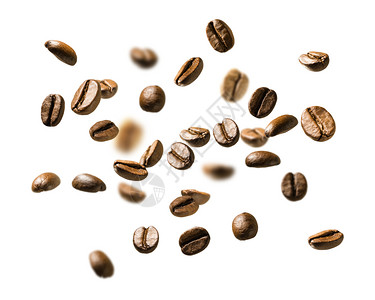 白色背景中飘浮着的咖啡豆背景图片