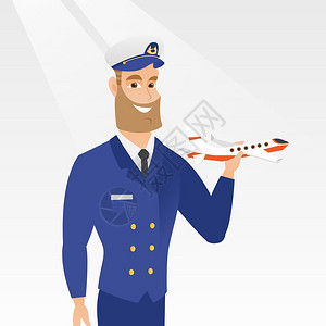 飞机模型与书籍手持飞机模型的年轻天主教航空飞行员穿着制服的流行航空飞员与机模型一起微笑的飞行员矢量漫画插图方形布局与飞机模型一起愉快的航空飞行插画