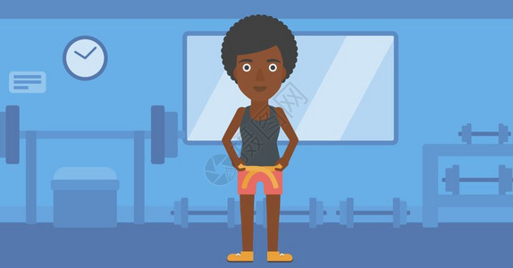 一名非裔美国妇女用一张带子测量腰部图片