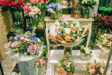 春天橱窗鲜花店的花束展示橱窗背景