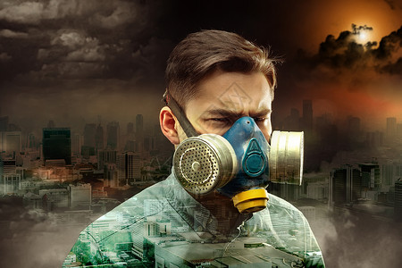 大气污染素材夜间城市毒气喷雾中的青年男子大气污染毒喷雾中的青年男子背景