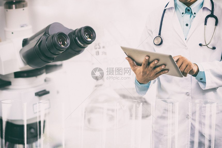 科学仪器显微镜和化学测试管图片