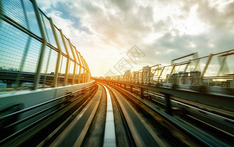 火车在城市铁路隧道移动抽象背景图片