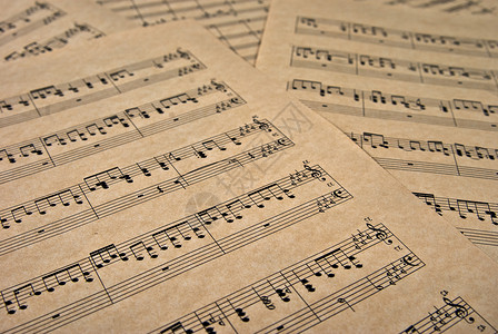 棕色羊皮纸上的音乐笔记棕色羊皮纸上的音乐笔记图片