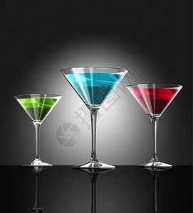 3个透明的蓝色红和绿鸡尾酒杯在吧表面反射3维插图红色绿和蓝鸡尾酒杯图片