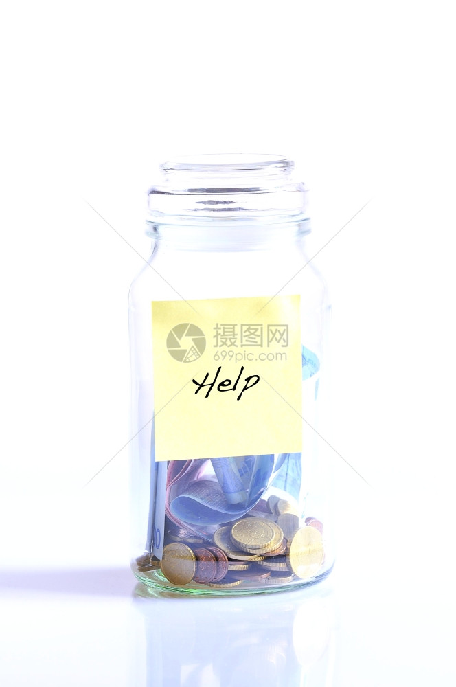 玻璃罐硬币在白背景和单词帮助上被隔离图片