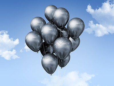 蓝天上漂浮的银气球图片