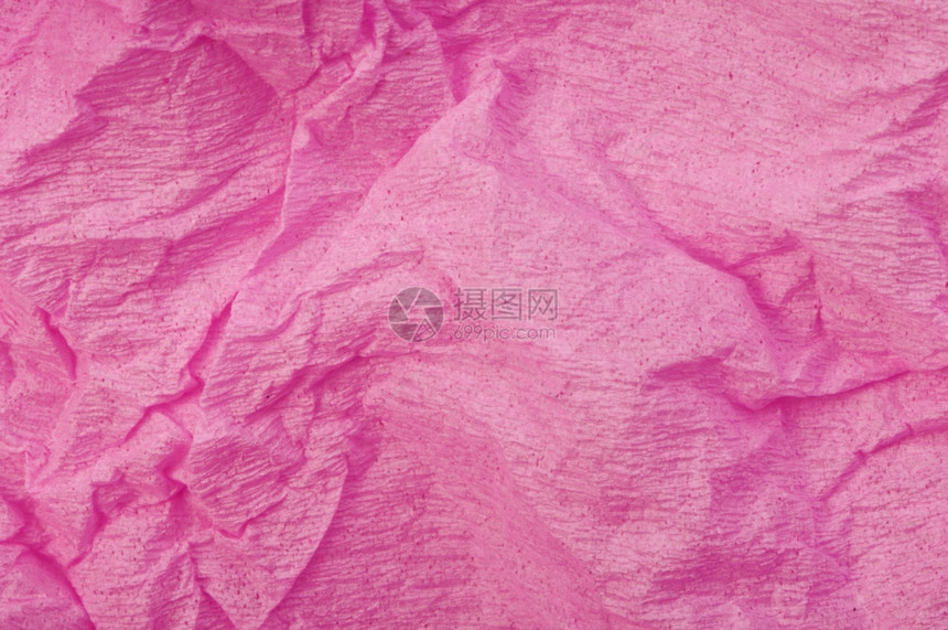 粉红色旧折叠纸背景图片
