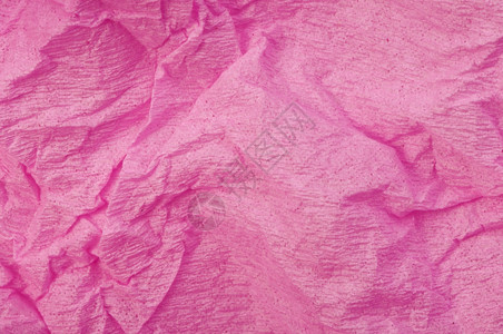 粉红色旧折叠纸背景图片