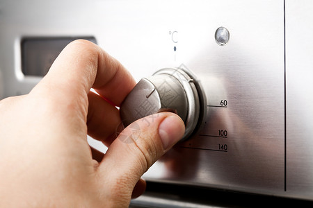 烤箱按钮使用烤箱炉温控制封闭背景