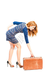女孩抬起手提箱图片