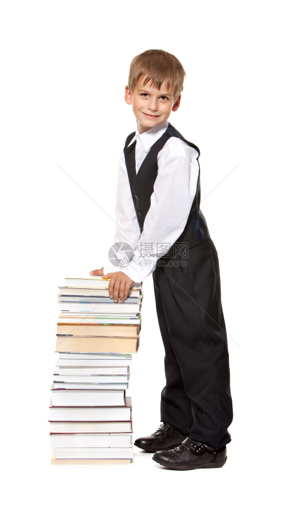 男孩的书和在白色背景上孤立的书回到学校图片