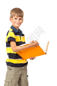 学校的男孩拿着一本书孤立在白人背景上回到学校图片