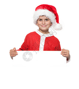 男孩持有在白色背景上孤立的圣诞节海报图片