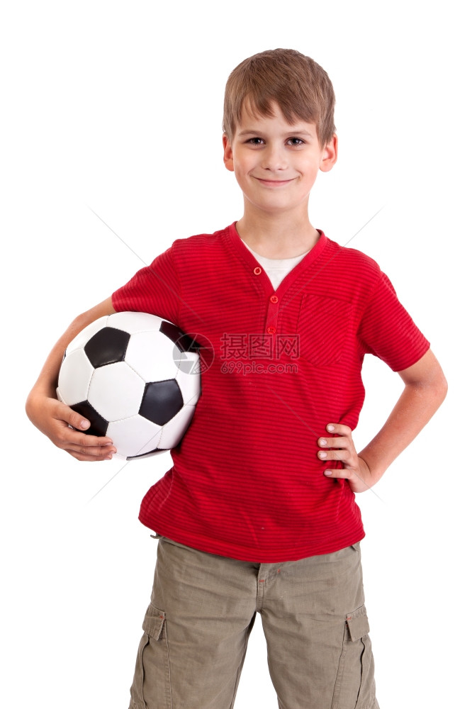 可爱的男孩拿着一个足球图片