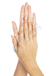 一双涂着裸色指甲油的手背景图片