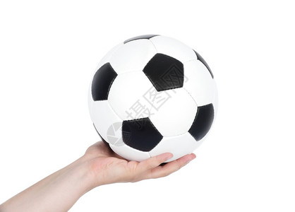 用手握着足球孤立在白色上高清图片
