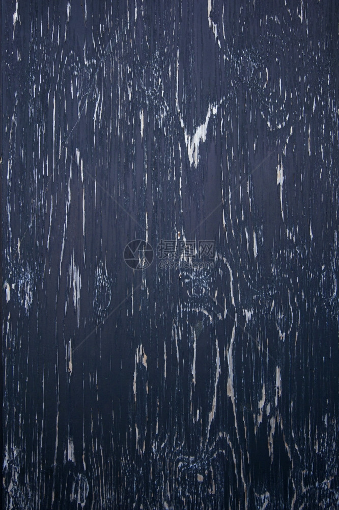 由含有蓝黑色剥皮涂料模式的木材构成背景图片