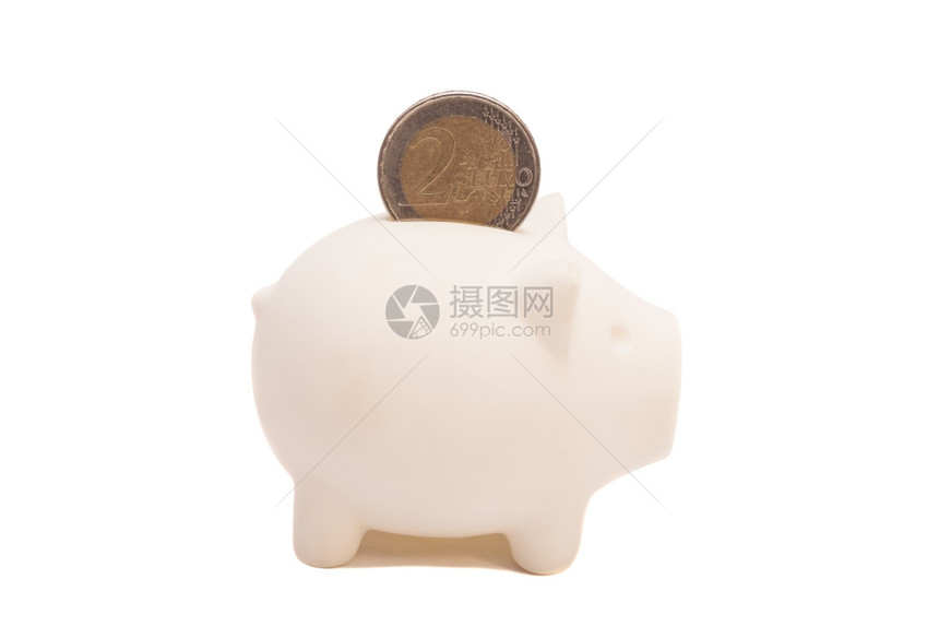 带欧元硬币的猪银行图片