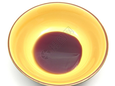 一碗陶瓷白上加南瓜种子油背景图片
