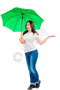 绿色伞式女孩的垂直照片图片