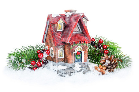 圣诞节由树雪和玩具屋组成图片