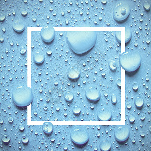 蓝色背景和设计框架模板上的水滴图片