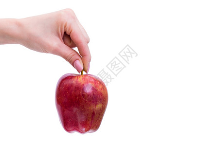 女手与白背景上孤立的苹果背景图片