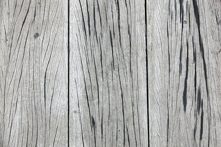 旧粗纹灰色木板带裂缝图片