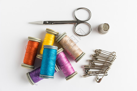 裁剪别针缝纫背景木制针线剪刀缝纫用品的支架缝纫用品背景