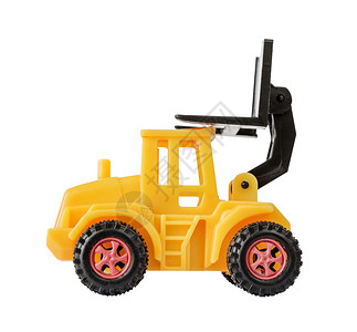 黄色载卸车由塑料制成的黄色玩具叉车装有一辆举起的载车孤立在白色背景上侧视图背景