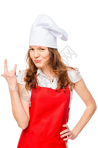 身着帽子和围裙的女孩在白色背景上展示手势图片